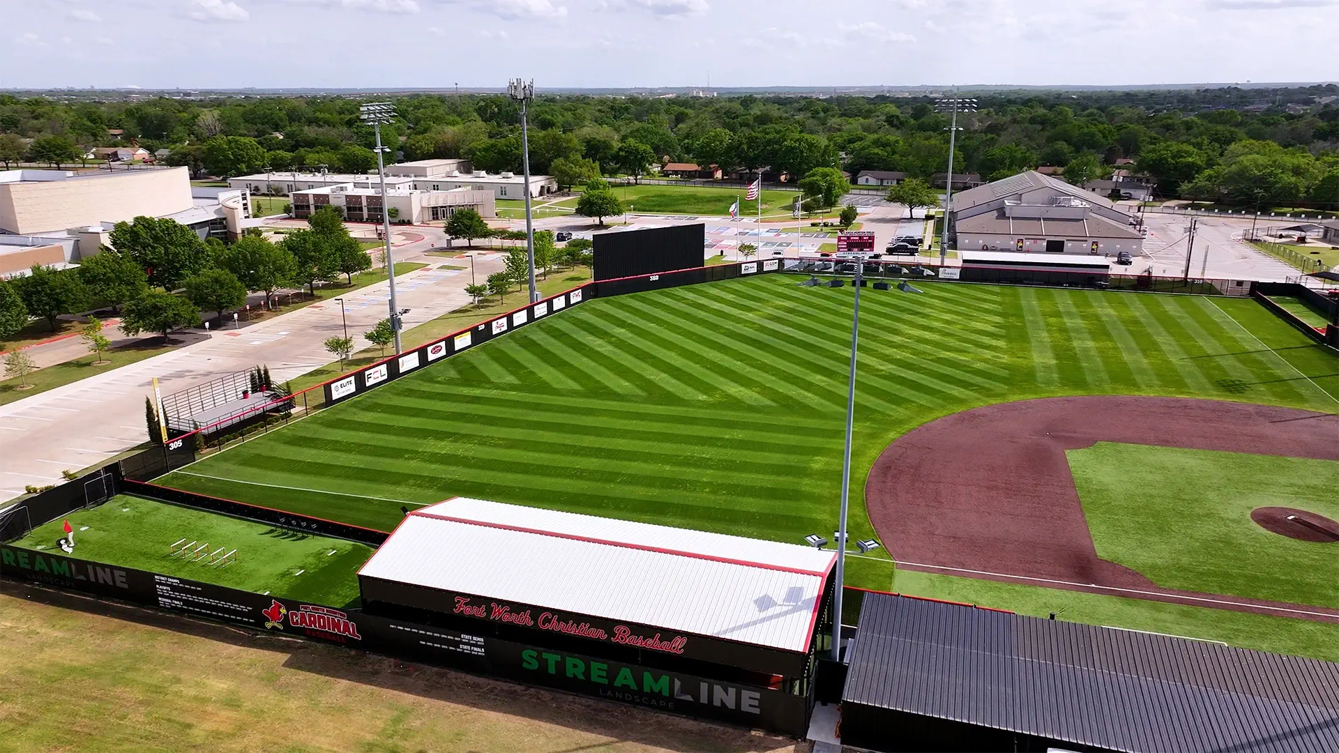 Crosshatch mowing stripes on a professionally maintained baseball outfield